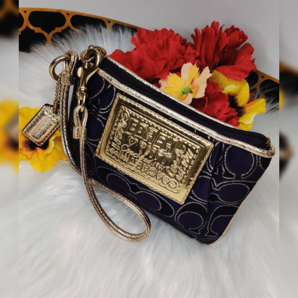 Coach Poppy purple wristlet bag